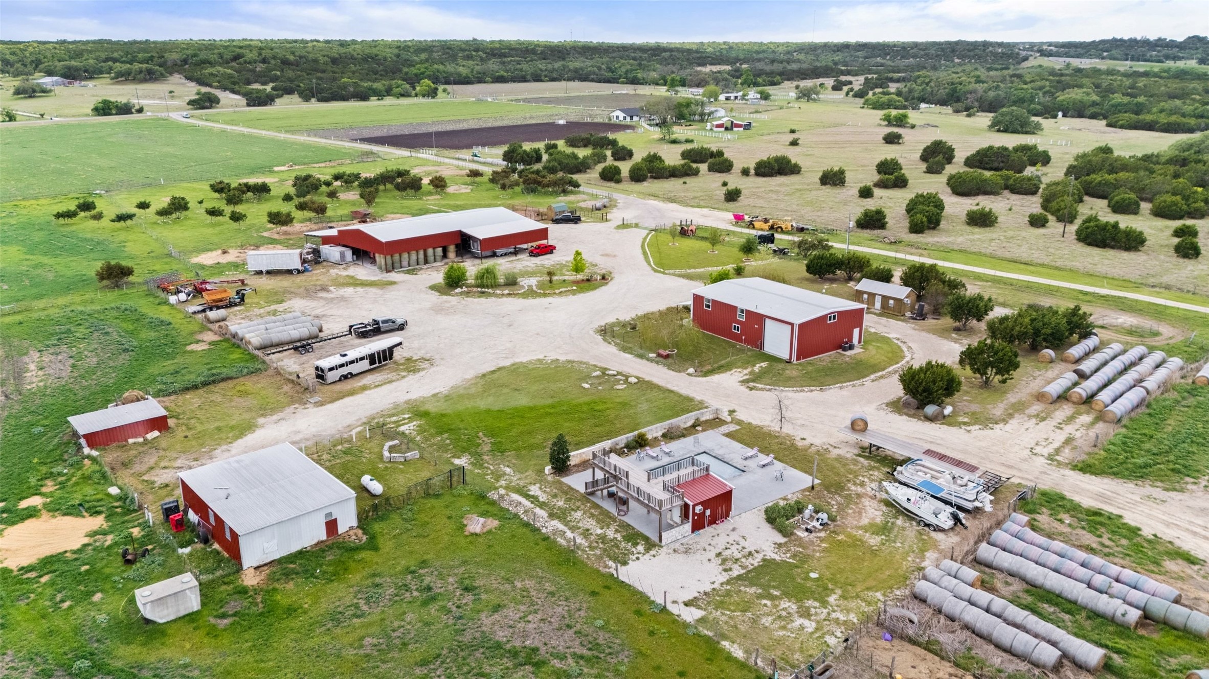 1301 County Road 228 Florence, TX 76527 - Photo 10 of 40 an aerial view of a city with lots of residential buildings ocean and mountain view