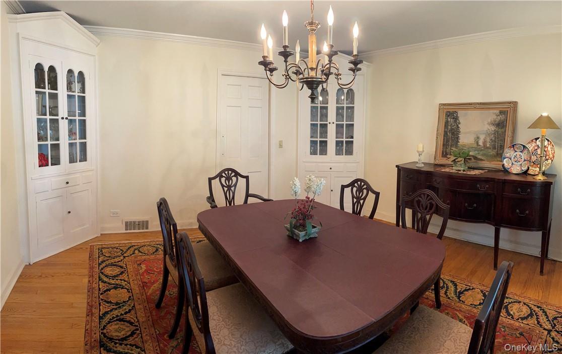 261 Fox Meadow Road Scarsdale, NY 10583 - Photo 3 of 18 Formal dinning room with built in cabinets