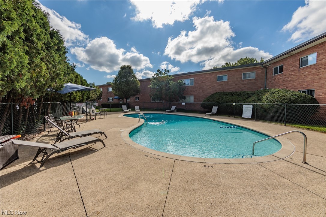 1750 Wagar Road, Unit 206 Rocky River, OH 44116 - Photo 30 of 33 View of swimming pool with a patio area