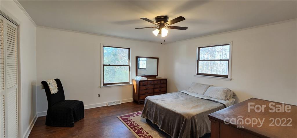 157 Moss Road Rutherfordton, NC 28139 - Photo 15 of 36 a bedroom with furniture and a window