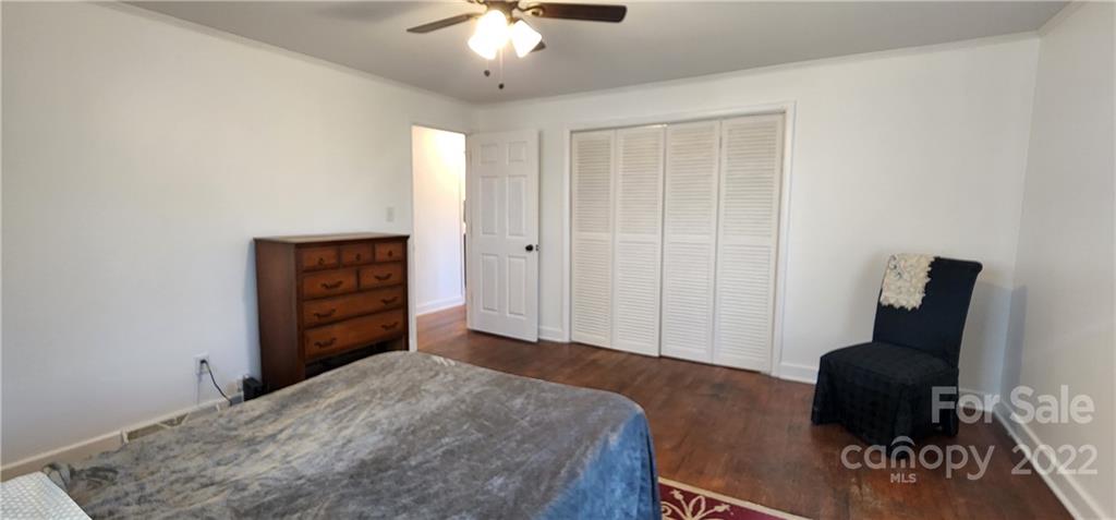 157 Moss Road Rutherfordton, NC 28139 - Photo 16 of 36 a bedroom with a bed and furniture