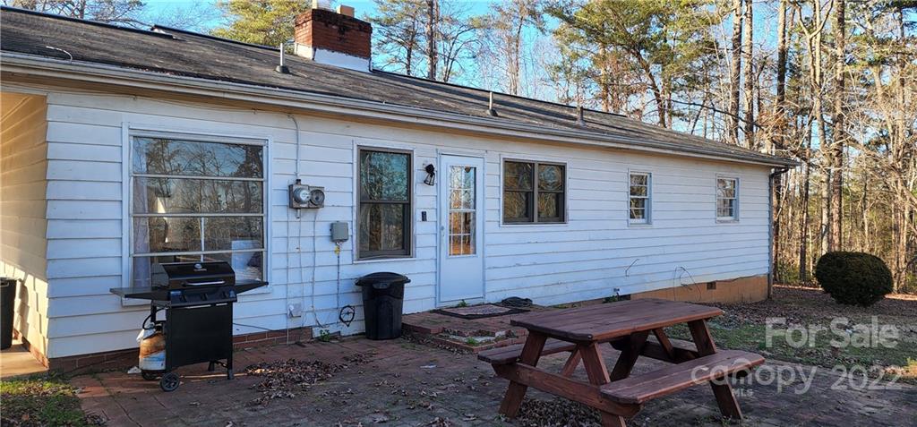 157 Moss Road Rutherfordton, NC 28139 - Photo 27 of 36 a backyard of a house with seating space