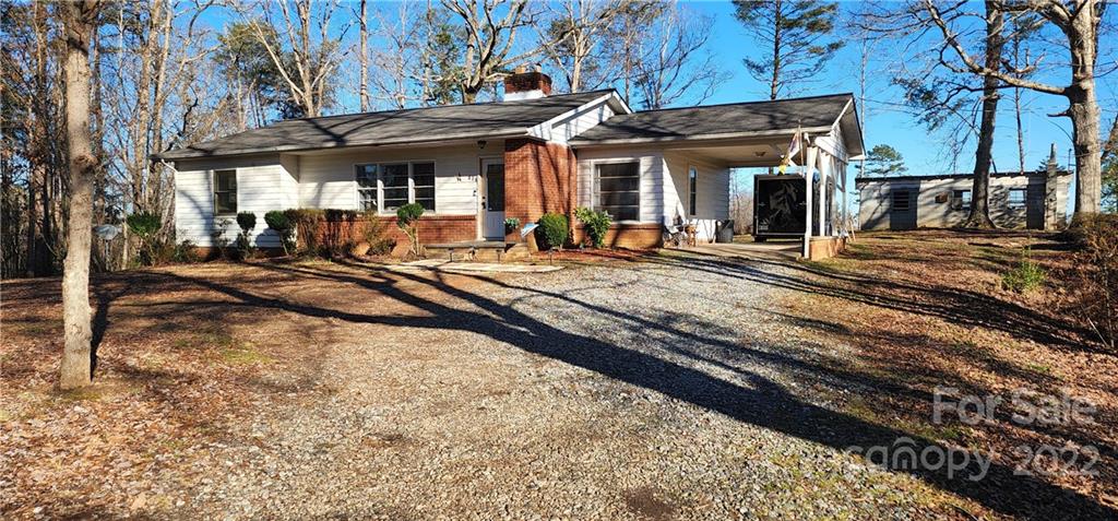 157 Moss Road Rutherfordton, NC 28139 - Photo 36 of 36 a view of a house with a patio