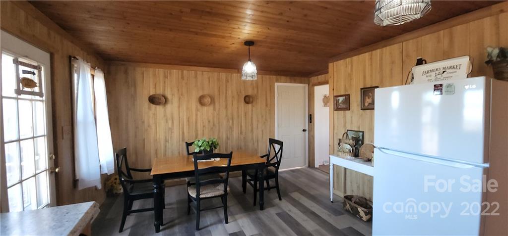 157 Moss Road Rutherfordton, NC 28139 - Photo 7 of 36 a dining room with furniture and window