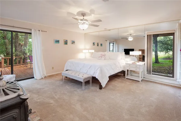 a bed room with a bed and a couch