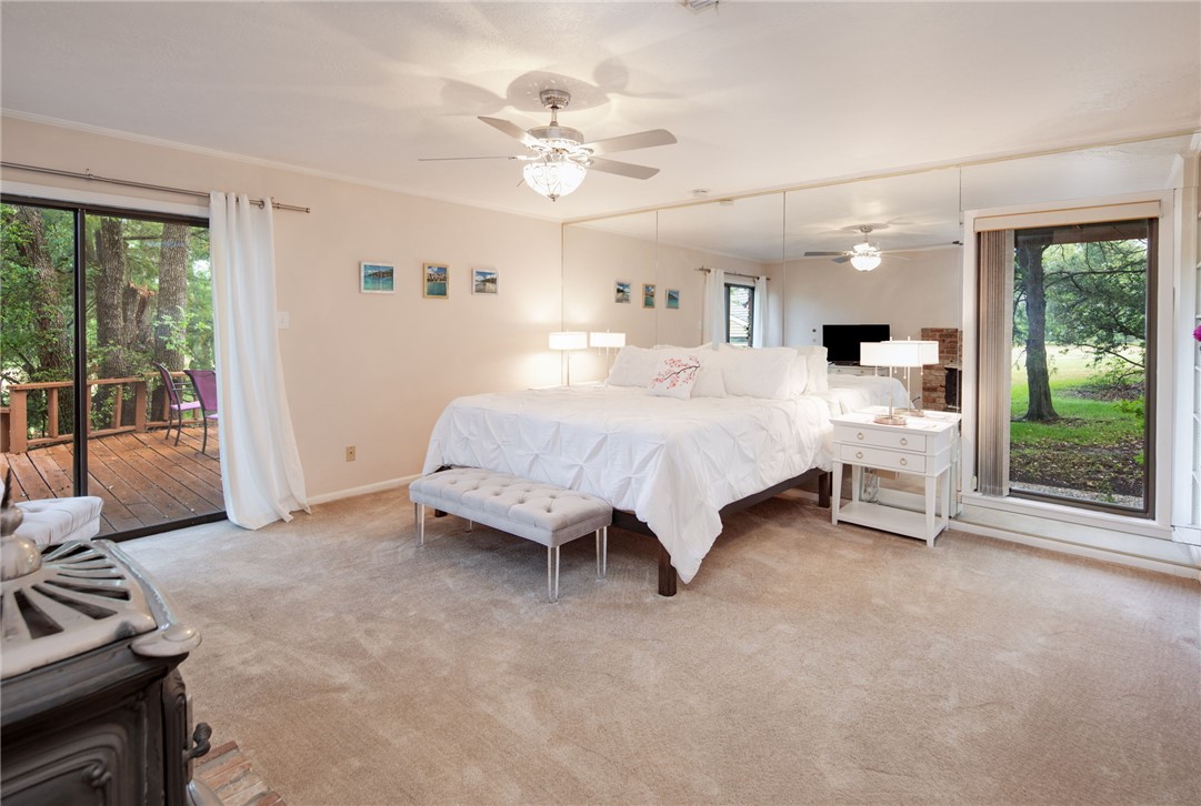 2902 Chaparral Circle Bryan, TX 77802 - Photo 12 of 26 a bed room with a bed and a couch