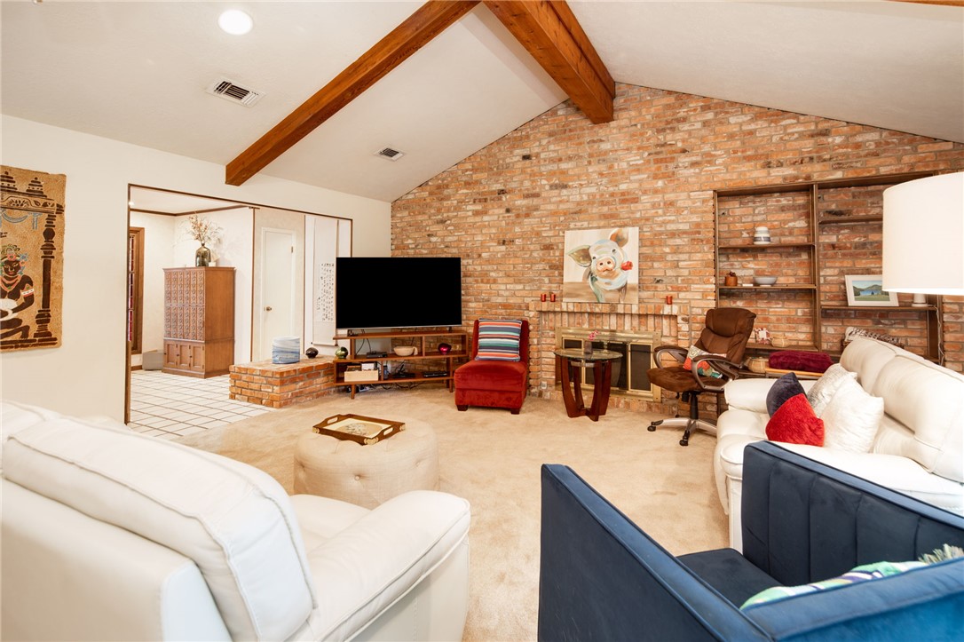 2902 Chaparral Circle Bryan, TX 77802 - Photo 6 of 26 a room with furniture and flat screen tv