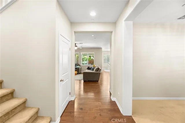 a bathroom with a sink vanity granite and a mirror