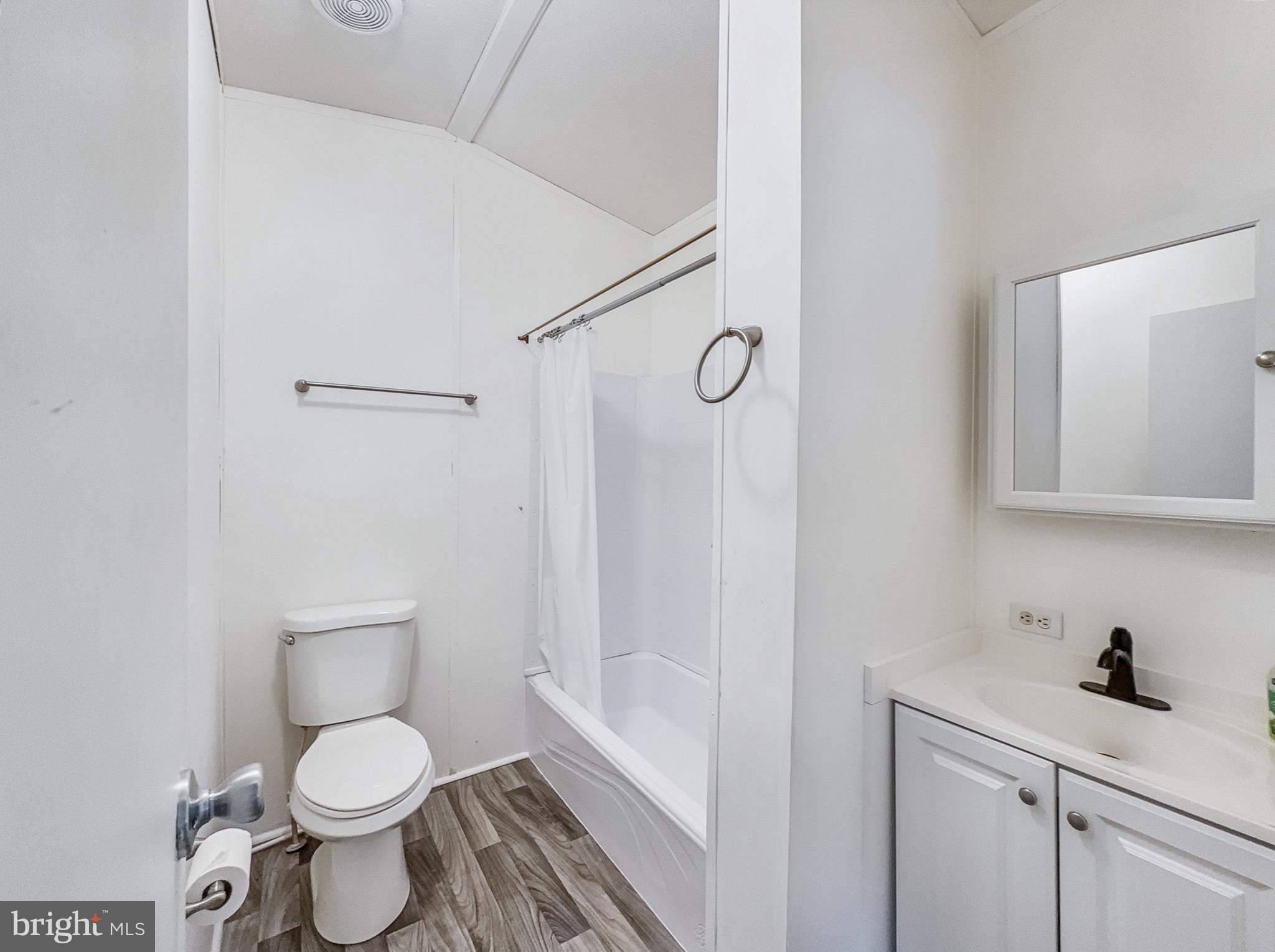 4820 Old Harrisburg Road Gettysburg, PA 17325 - Photo 11 of 15 a white toilet sitting next to a bathroom sink