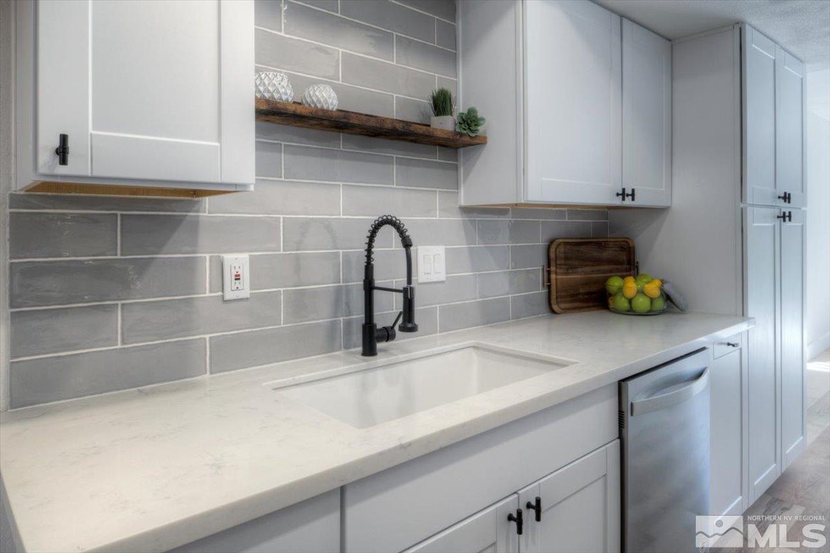 2014 Branch Reno, NV 89509 - Photo 1 of 40 a kitchen with a sink and a potted plant on it