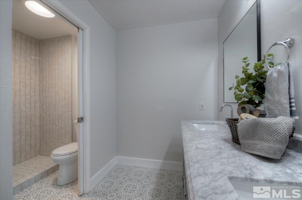 2014 Branch Reno, NV 89509 - Photo 16 of 40 a living room with furniture and a potted plant