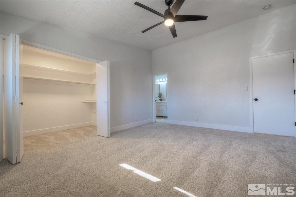 2014 Branch Reno, NV 89509 - Photo 20 of 40 an empty room with closet and fan
