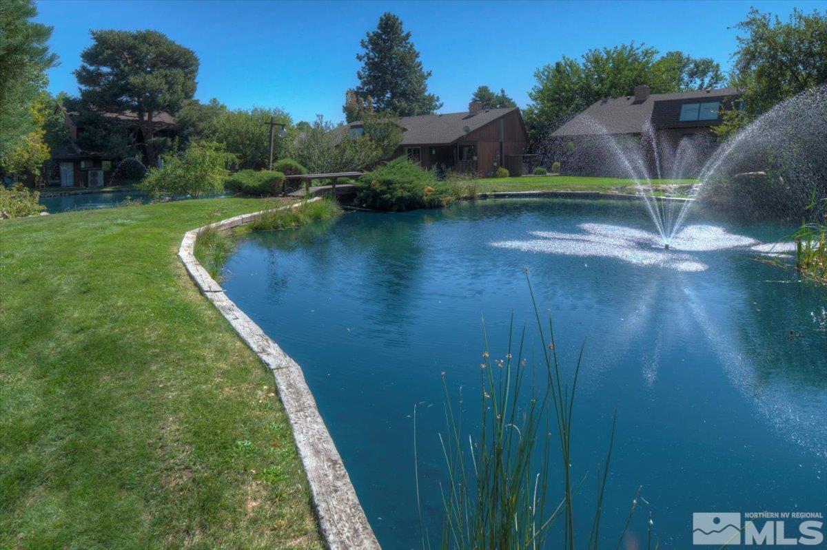2014 Branch Reno, NV 89509 - Photo 40 of 40 a view of a water pond with green yard