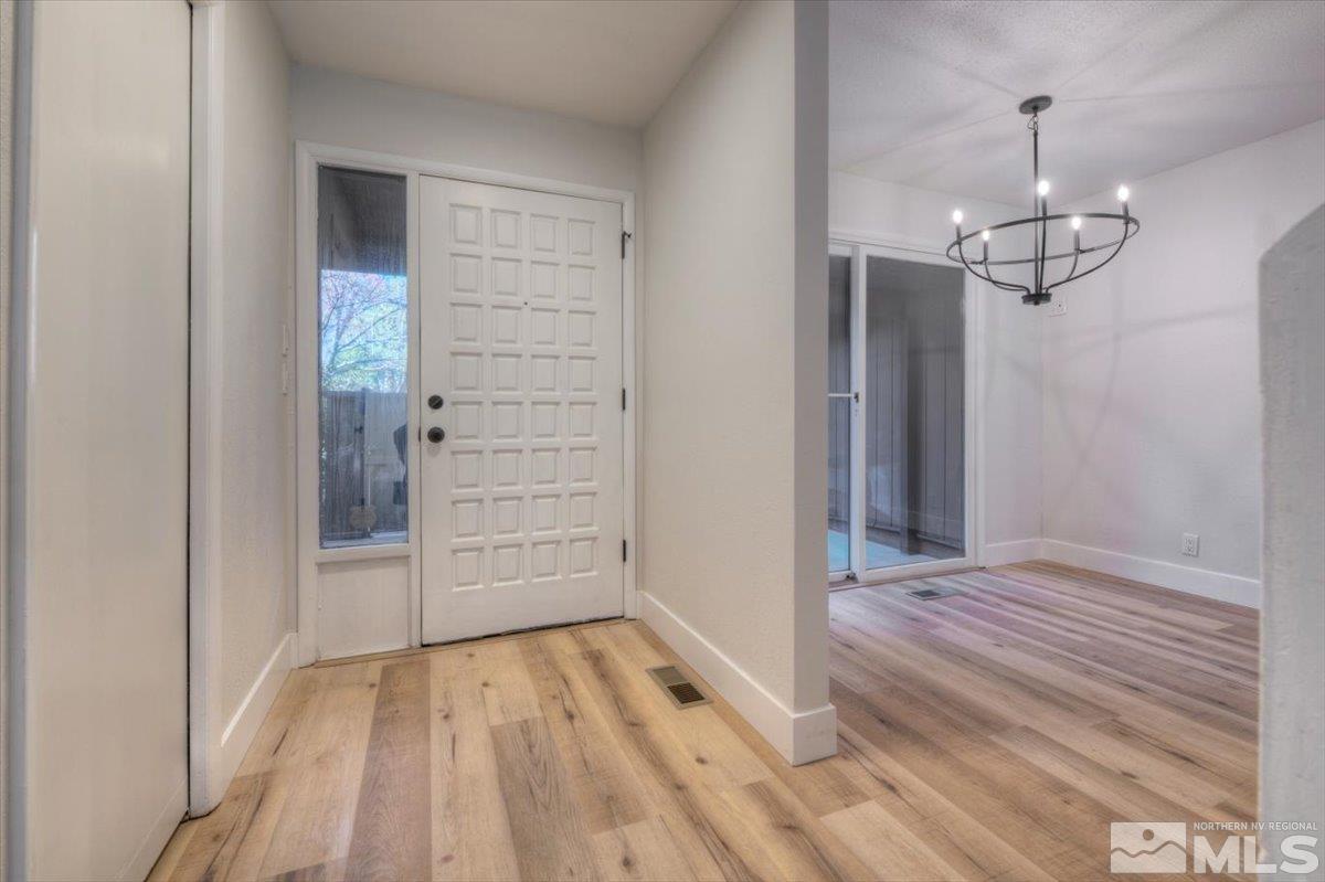 2014 Branch Reno, NV 89509 - Photo 4 of 40 a view of empty room with wooden floor