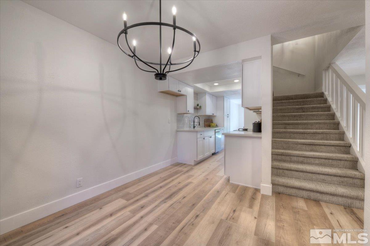 2014 Branch Reno, NV 89509 - Photo 5 of 40 a view of a livingroom with wooden floor and staircase