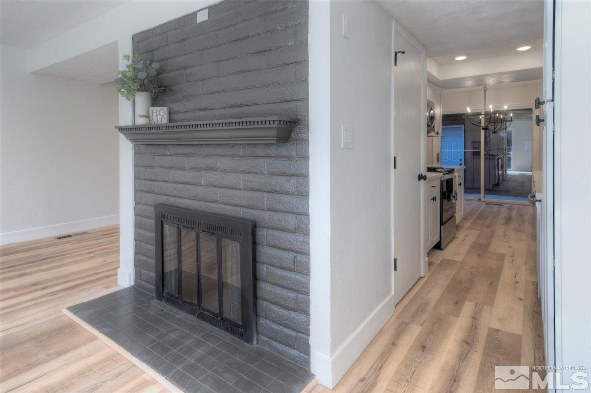 2014 Branch Reno, NV 89509 - Photo 6 of 40 a hall way with wooden floor and staircase