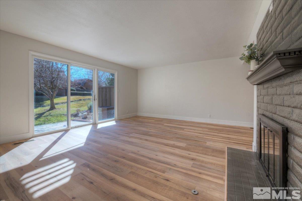 2014 Branch Reno, NV 89509 - Photo 7 of 40 a view of empty room with wooden floor and fan