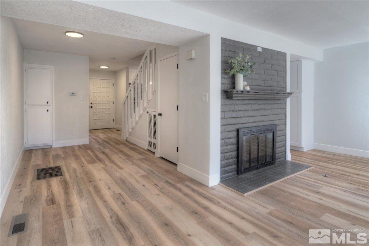 2014 Branch Reno, NV 89509 - Photo 9 of 40 a view of a livingroom with wooden floor and staircase