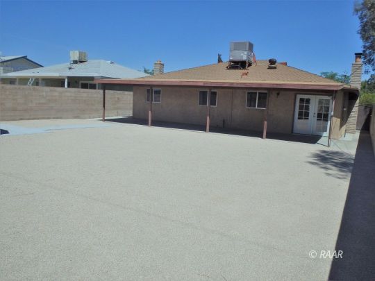601 Weiman Avenue Ridgecrest, CA 93555 - Photo 33 of 35 a front view of a house with a yard