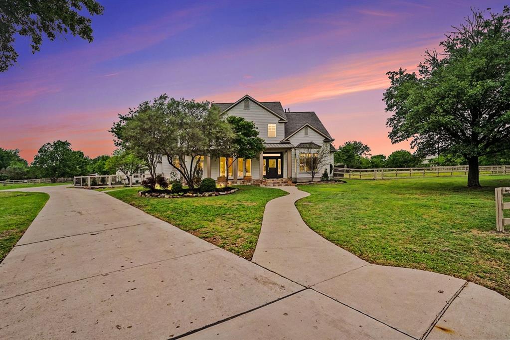 3923 Ranch Estates Circle Plano, TX 75074 - Photo 32 of 32 a front view of a house with garden