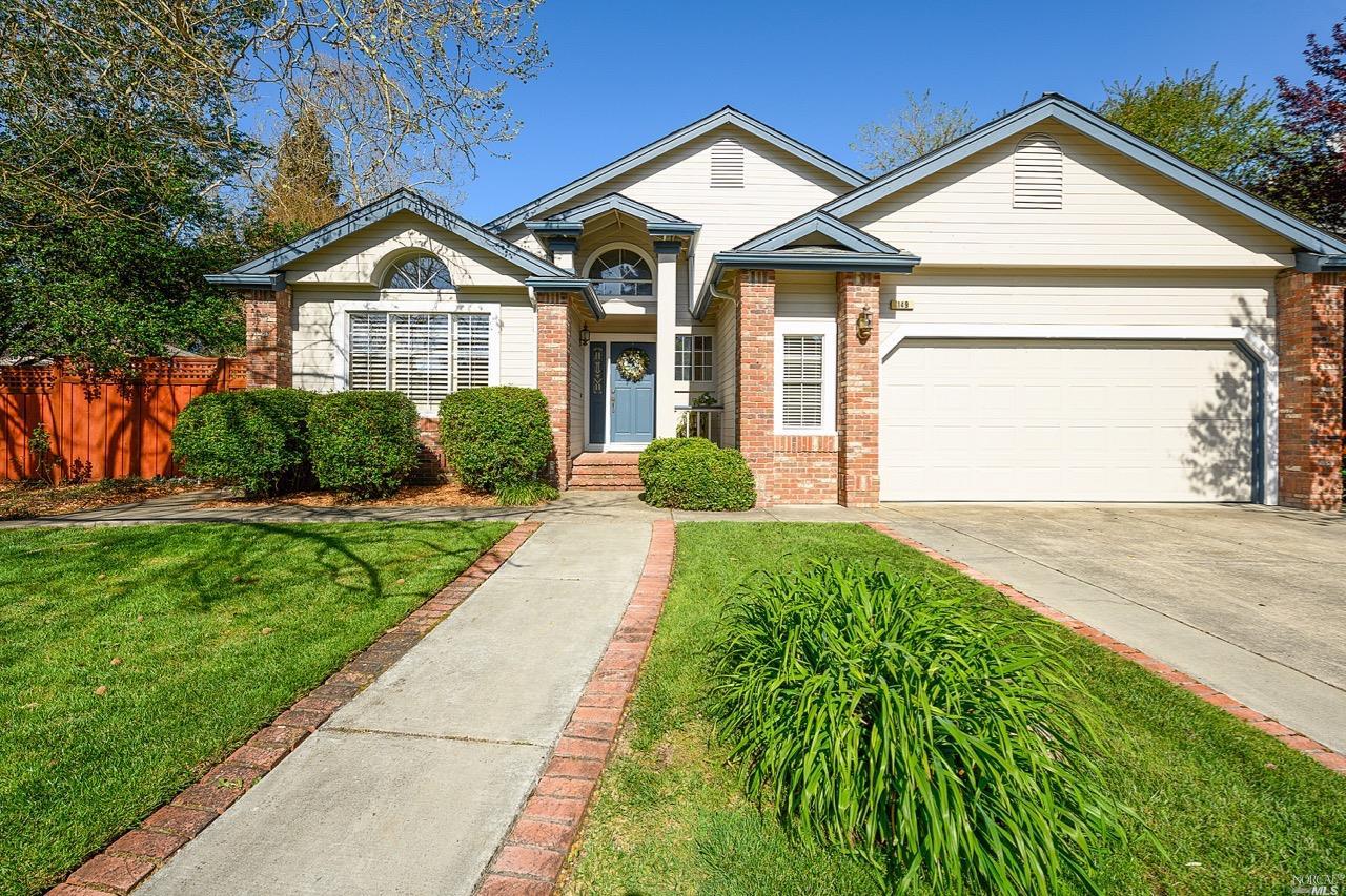 149 Hop Ranch Road Santa Rosa, CA 95403 - Photo 1 of 1 a front view of a house with a yard and garage