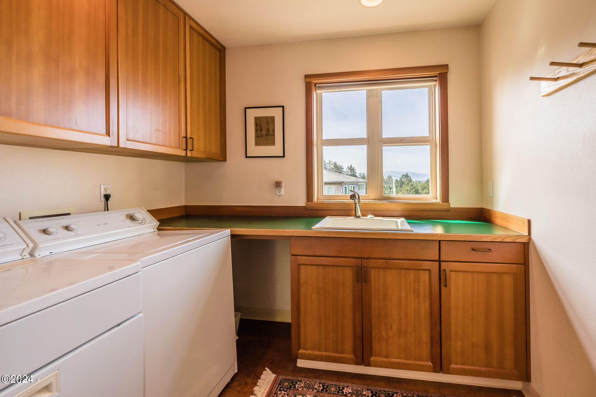 6855 Nestucca Ridge Road Pacific City, OR 97135 - Photo 10 of 44 a utility room with dryer and washer