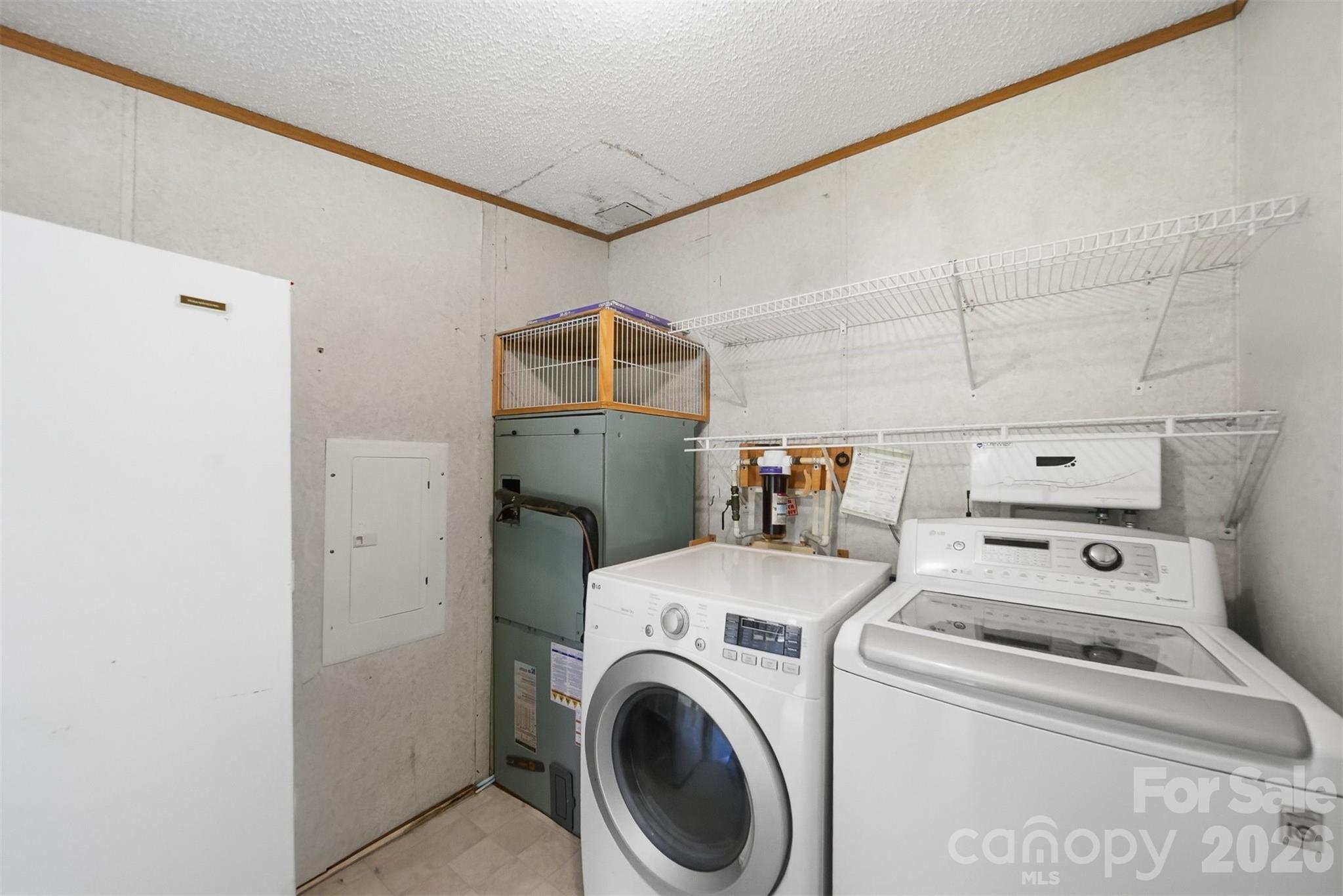 1488 Watermill Road Morganton, NC 28655 - Photo 24 of 38 a utility room with dryer and washer