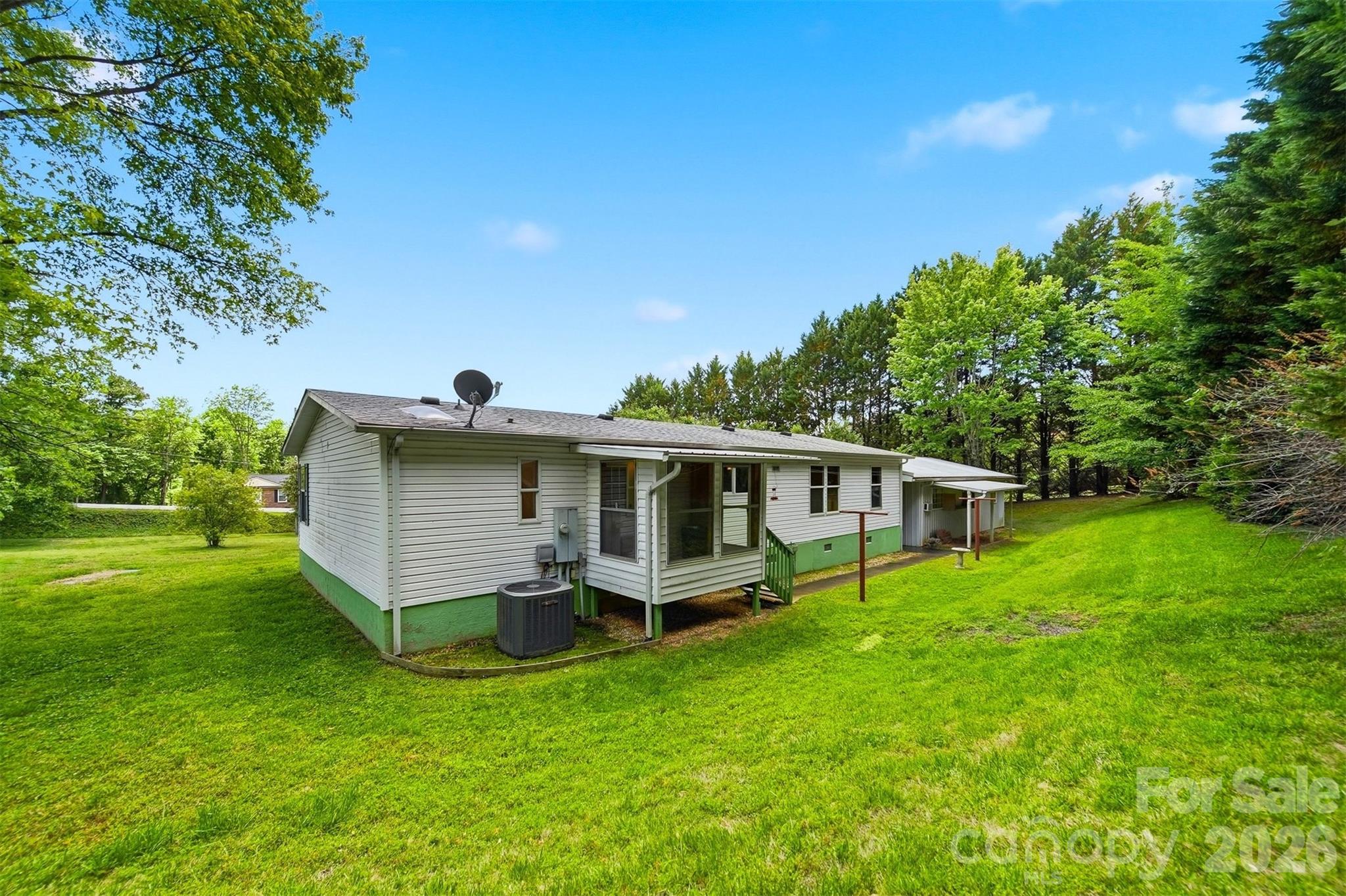 1488 Watermill Road Morganton, NC 28655 - Photo 28 of 38 a view of a house with a yard