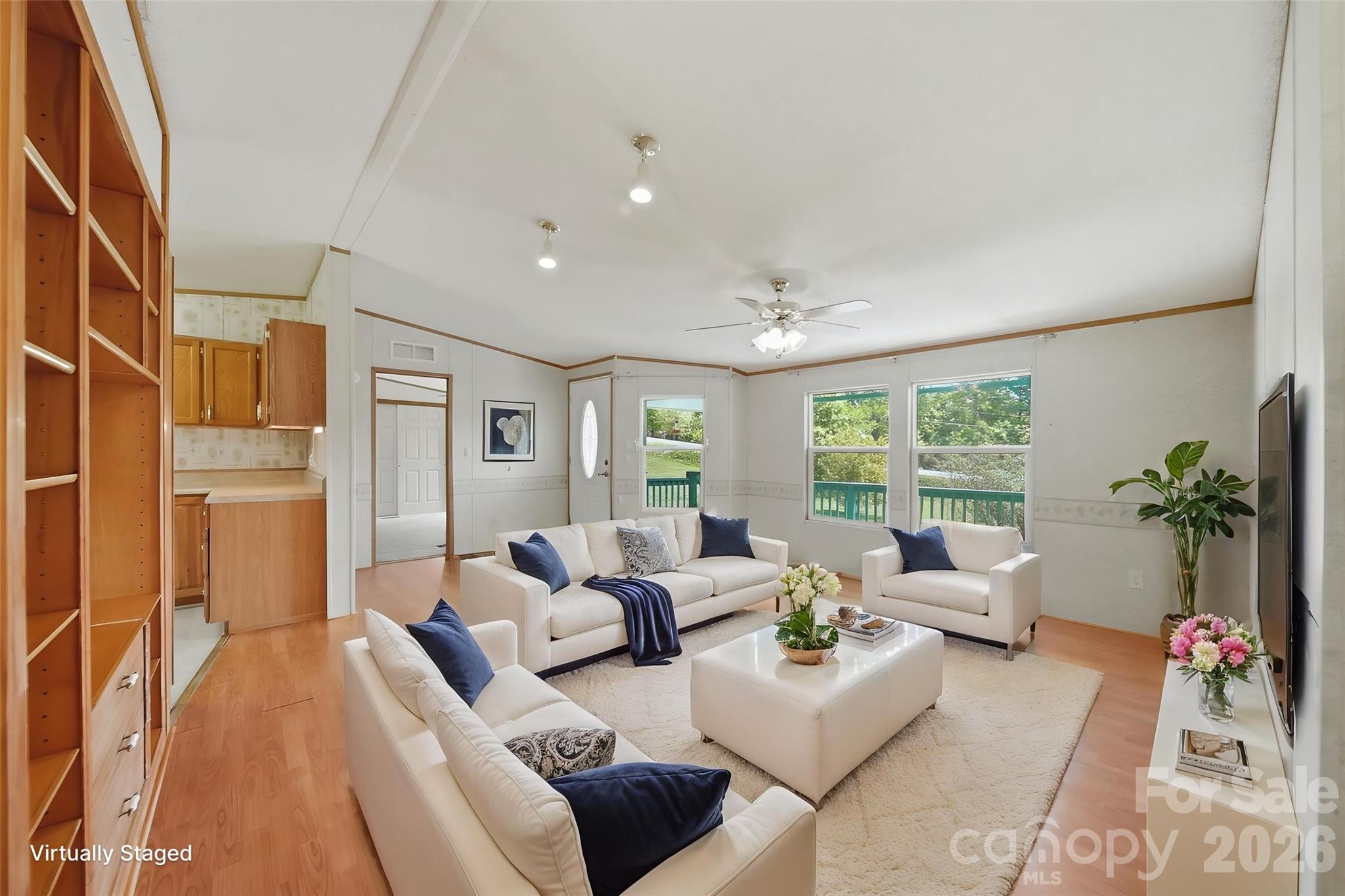 1488 Watermill Road Morganton, NC 28655 - Photo 3 of 38 a living room with furniture and a large window