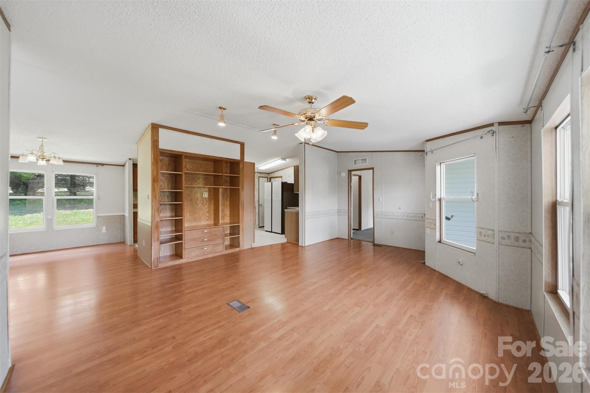 1488 Watermill Road Morganton, NC 28655 - Photo 4 of 38 wooden floor in an empty room with a window