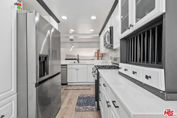 $677,000 | 18415 Collins Street, Unit F, Tarzana, CA 91356