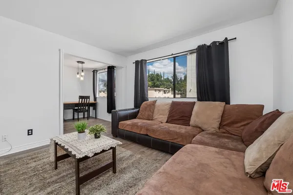 $677,000 | 18415 Collins Street, Unit F, Tarzana, CA 91356