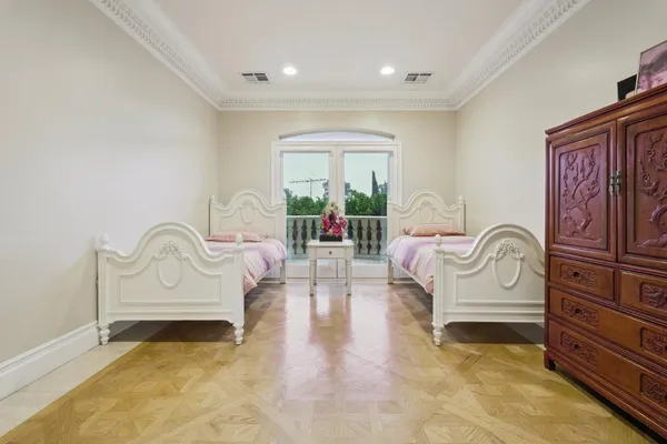 a living room with furniture a fireplace and windows