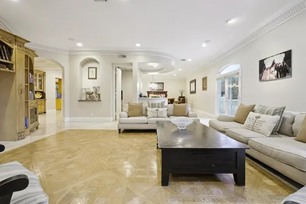 a living room with furniture and a table