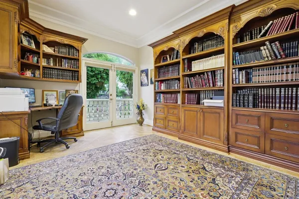 a workspace with bookshelf