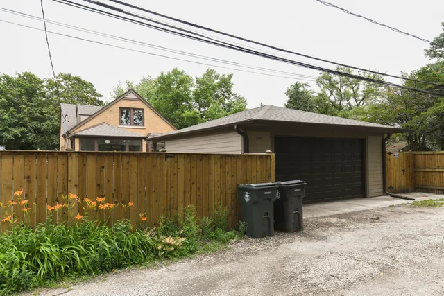 a front view of a house with garage