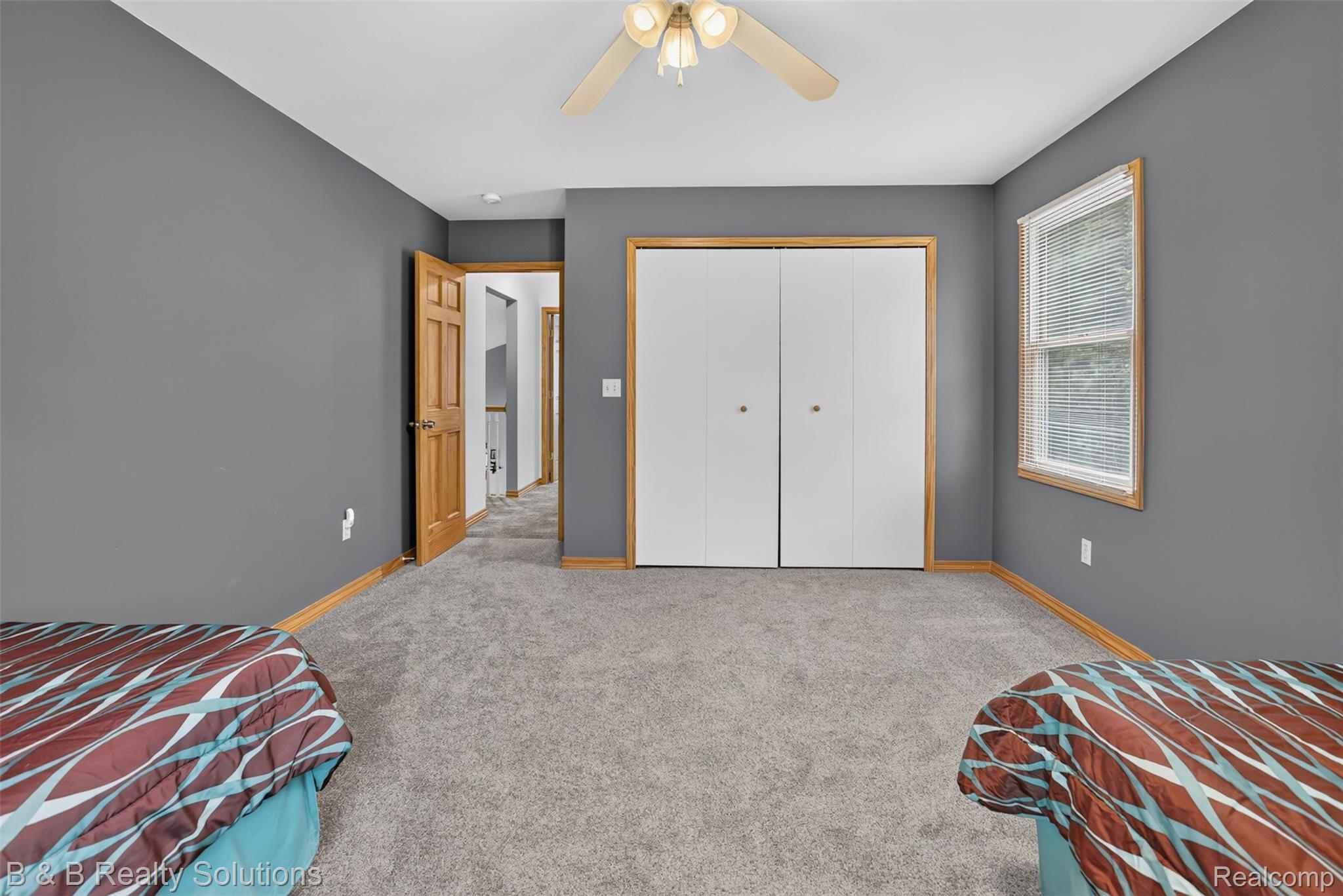 3097 East Burnside Road North Branch, MI 48461 - Photo 30 of 52 Carpeted interior space featuring grey walls and light wood trim