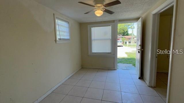 930 18th Street, Unit B Orlando, FL 32805 - Photo 4 of 11 a view of an empty room with a window