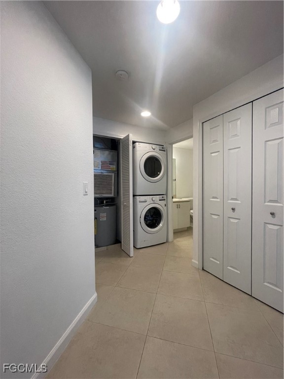 8416 Bernwood Cove Loop, Unit 1611 Fort Myers, FL 33966 - Photo 18 of 50 a utility room with dryer and washer
