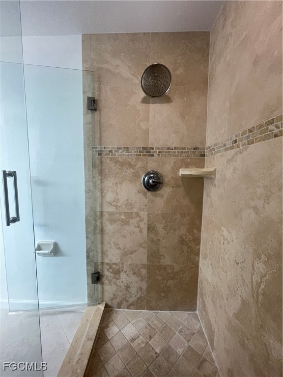 8416 Bernwood Cove Loop, Unit 1611 Fort Myers, FL 33966 - Photo 28 of 50 a bathroom with a shower