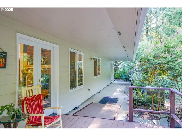 a view of house with backyard space and garden