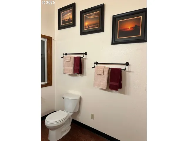 a bathroom with a toilet and a sink