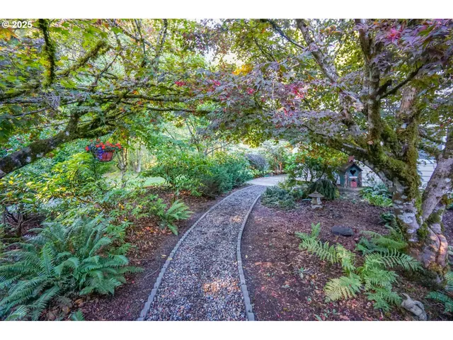a backyard of a house with lots of green space