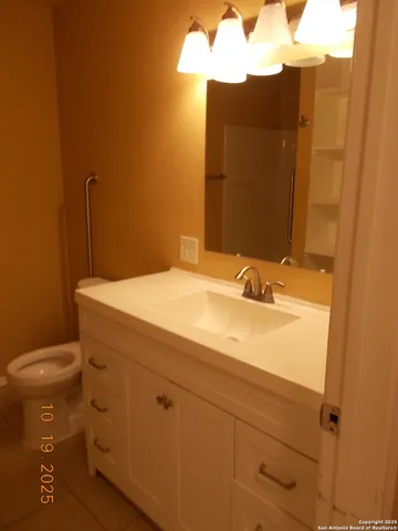 a bathroom with a sink and a toilet