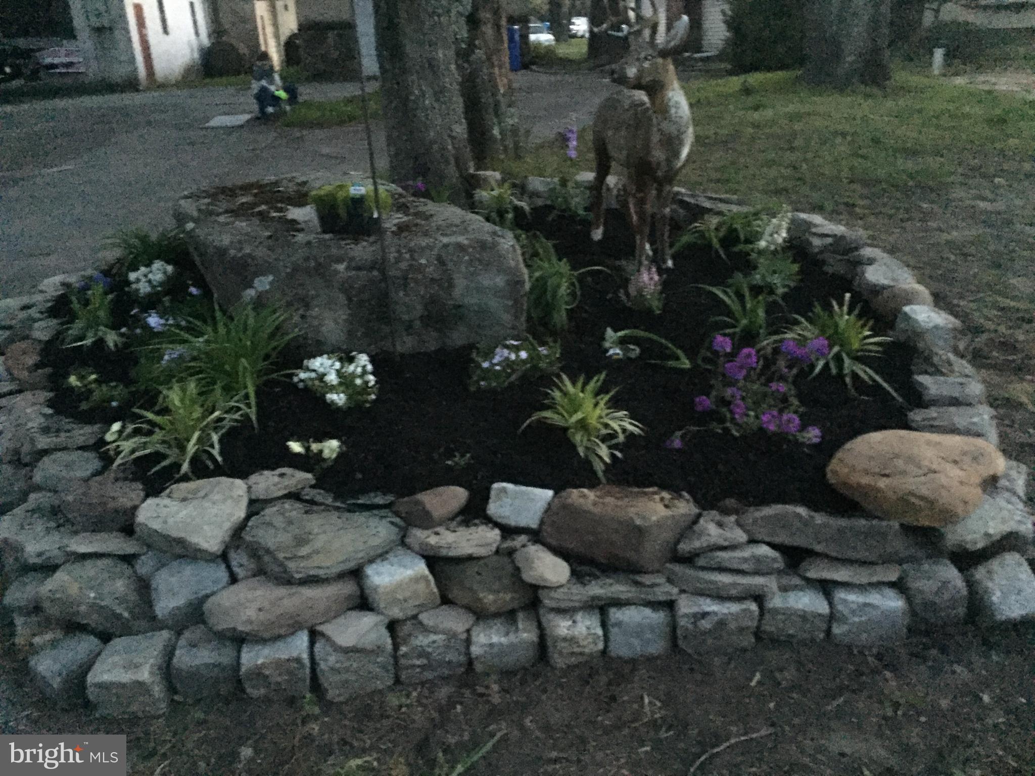 324 Atsion Road Shamong, NJ 08088 - Photo 54 of 67 Stone deer garden bed at front driveway entrance
