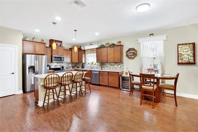 a view of a living room and dining room