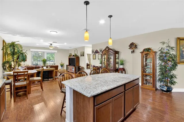 a bed room with a bed and a chandelier