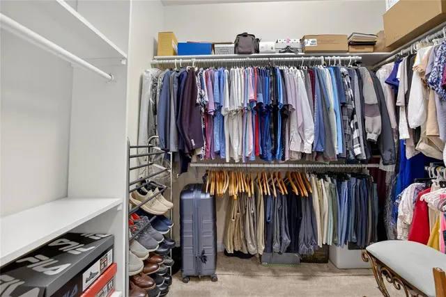 a living room with furniture and garden view