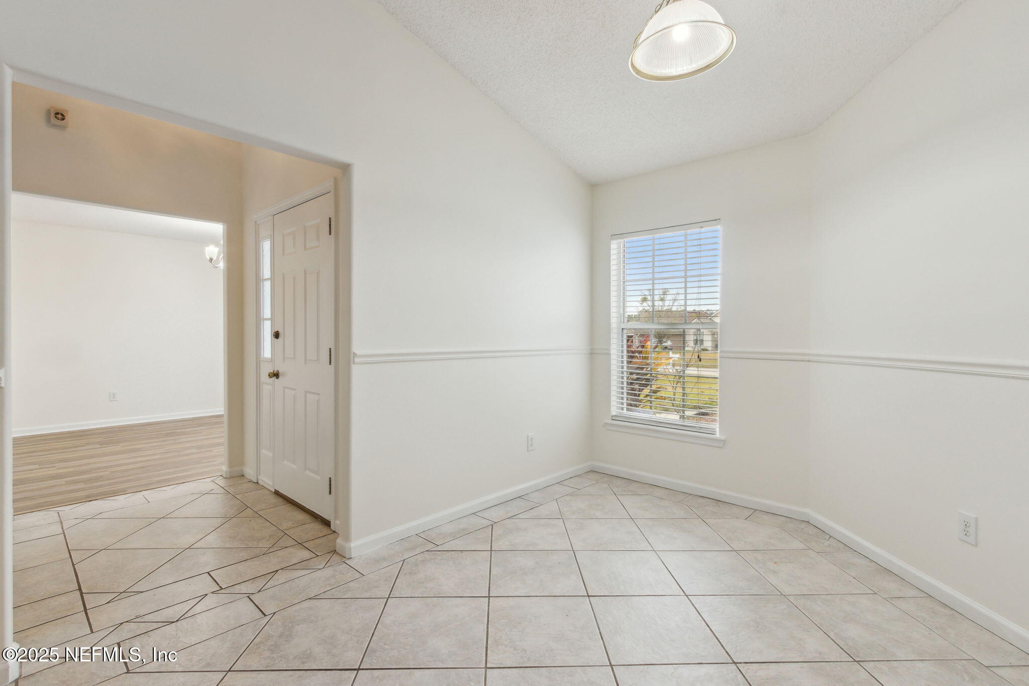 2005 Frogmore Drive Middleburg, FL 32068 - Photo 12 of 43 an empty room with a empty space and windows