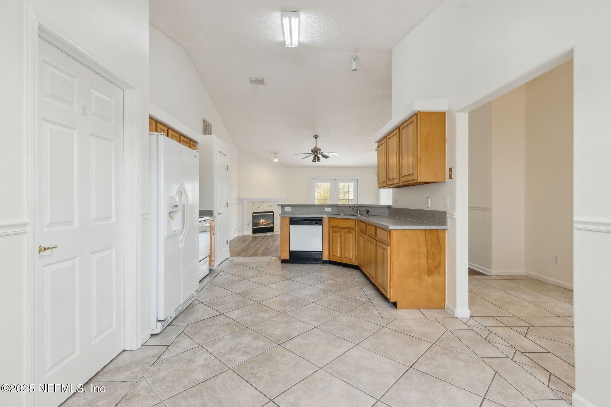2005 Frogmore Drive Middleburg, FL 32068 - Photo 16 of 43 a large kitchen with cabinets and stainless steel appliances